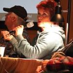 Joyce Anderson Turkington introduces herself and where she grew up during a presentation of Homestead Kids: Tales from the North Fork on Thursday, Dec. 13, 2018 at the Alaska Islands and Oceans Visitor Center in Homer, Alaska. (Photo by Megan Pacer/Homer News)