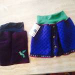 Two of Chelsey Arnos Skinny Owlz skirts as seen at her Ptarmigan Arts display in Homer, Alaska. (Photo by Emilie Springer)