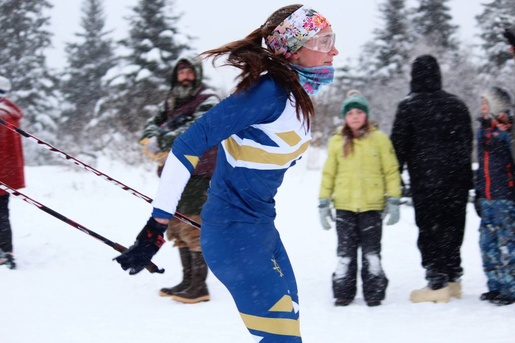 Homer junior Autumn Daigle breezes across the finish line to take first place in the girls race at a Homer-hosted ski meet Friday, Dec. 14, 2018 at the Ohlson Mountain Trails near Homer, Alaska. The meet was moved to Homer after it was decided the Tsalteshi Trails system in Soldotna didnt have enough snow. (Photo by Megan Pacer/Homer News)