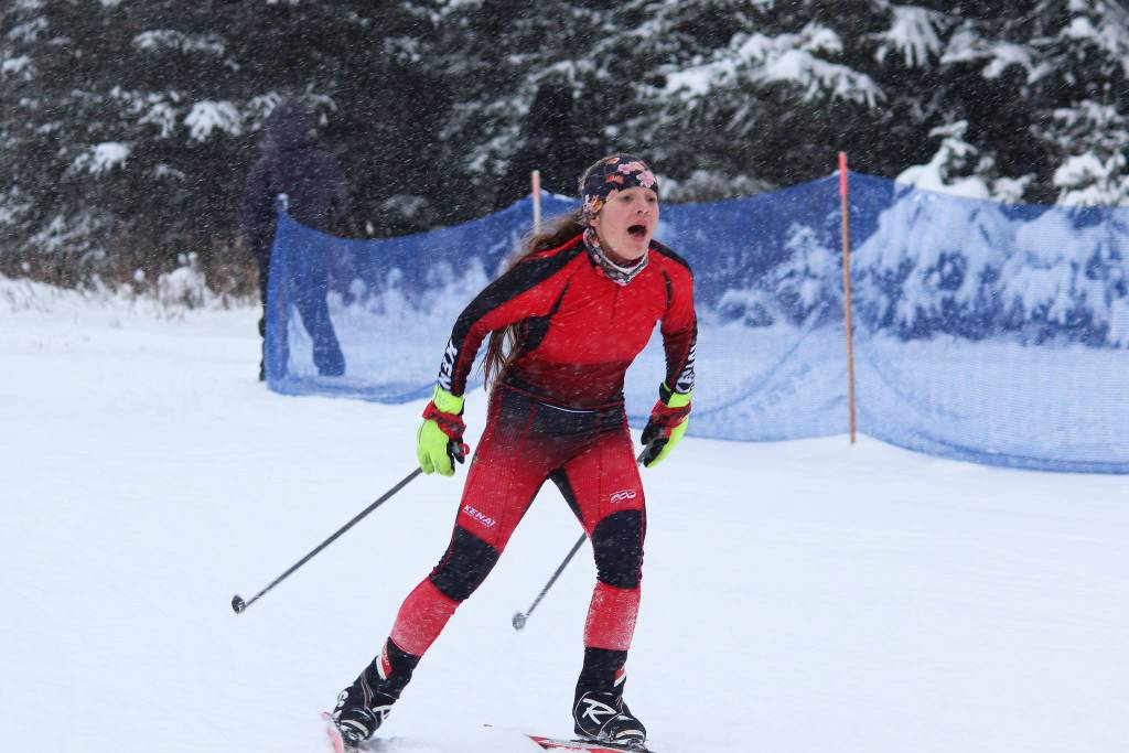 Kenai senior Maria Salzetti approaches the finish line of the girls race during a Homer-hosted ski meet Friday, Dec. 14, 2018 at the Ohlson Mountain Trails near Homer, Alaska. Salzetti came in second for the varsity girls. (Photo by Megan Pacer/Homer News)