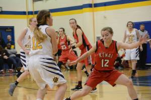 Kardinal Hayley Maw plays defense on Mariner Rylee Doughty during a game against the Homer Mariner girls basketball team on Friday, Dec. 21, 2018, in Homer, Alaska. (Photo by Michael Armstrong/Homer News)
