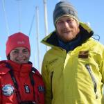 Anna Vazhenina , left,and Anatoly Kazakevich, right, pose for a photo on their inflatable catamaran, Iskatel, last Thursday morning, Aug. 30, 2018, at the Homer, Alaska, harbor. They finished sailing from Lake Baikal, Russia, to Homer, on Aug. 26. (Homer News file photo)