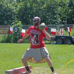 A novice competitor prepares to throw a braemar stone during the Kachemak Bay Scottish Highland Games on Saturday, July 7, 2018 at Karen Hornaday Park in Homer, Alaska. (Homer News file photo)