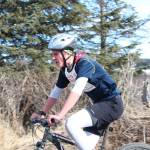 Homer High School senior Denver Waclawski bikes into the second transition station of this years Sea to Ski Triathlon. He finished first in all three legs of the race and took first place overall Sunday, March 25, 2017 in Homer, Alaska. (Homer News file photo)