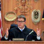 Anchorage Superior Court Judge Eric Aarseth speaks at an appeal of a recount in a Fairbanks state house race on Thursday, Dec. 20, 2018, in Anchorage, Alaska. The Alaska Supreme Court appointed Aarseth as a special master to prepare a report on an appeal of a recount in the race between Republican Bart LeBon and Democrat Kathryn Dodge. LeBon held a one-vote lead after the recount. (AP Photo/Dan Joling)