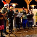 The Homer Ukulele Group performs at the Bear Creek Winerys Garden Lights last Saturday, Dec. 22, 2018, in Kachemak City, Alaska. More than 500 people attended that night for an evening of music, colorful lights and hot beverages. (Photo by Michael Armstrong/Homer News)