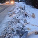 Debris from an exploded house lines the road near Mile 166 Sterling Highway on Friday, Dec. 28, 2018, near Homer, Alaska. The debris field from the explosion spread at least 200 feet in all directions. (Photo by Michael Armstrong/Homer News).