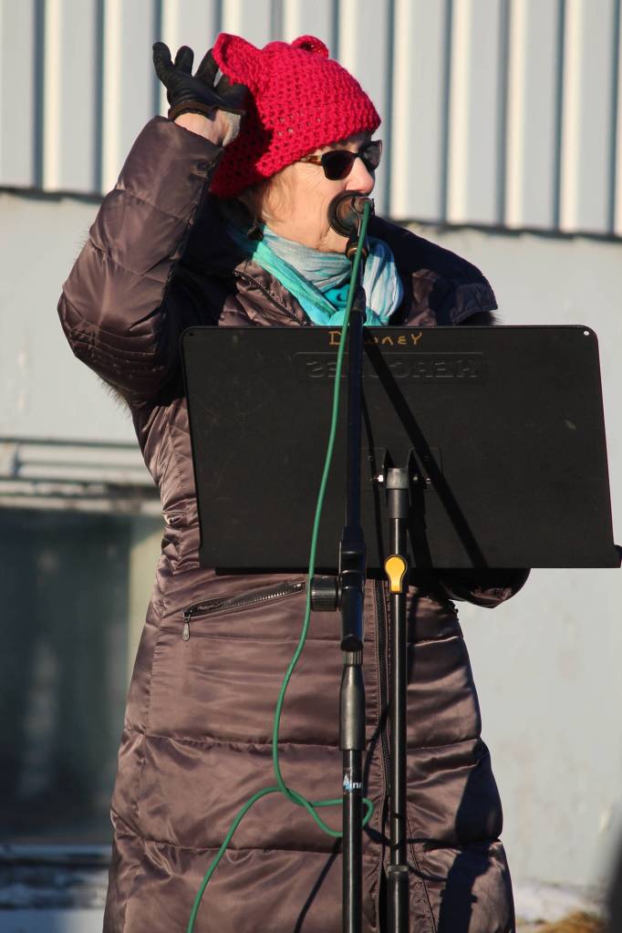 Susan Phillips Cushing speaks to a crowd of people before the third Womens March on Homer on Saturday, Jan. 19, 2019 at the Homer Education and Recreation Complex in Homer, Alaska. She was one of three speakers. (Photo by Megan Pacer/Homer News)