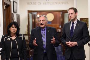 House Republicans Cathy Tilton, left, David Talerico, center, and Lance Pruitt speak to the press outside the House chambers after Gov. Mike Dunleavys State of the State speech on Tuesday. (Michael Penn | Juneau Empire)