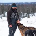 Musher Cim Smyth gives one of his dogs a pat just after finishing this years Tustumena 200 Sled Dog Race on Sunday, Jan. 27, 2019 at Freddies Roadhouse near Ninilchik, Alaska. (Photo by Megan Pacer/Homer News)