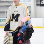 Homer senior Nikola Reutov is honored with his family on Senior Night for the Homer High School hockey team Thursday, Jan. 24, 2019 at Kevin Bell Arena in Homer, Alaska. The Mariners defeated Houston High School 10-1. (Photo by Megan Pacer/Homer News)