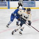 Homers Ethan Pitzman takes the puck toward Palmer territory during a Saturday, Jan. 26, 2019 game between the two schools at the Kevin Bell Ice Arena in Homer, Alaska. The Mariners beat Palmer 6-1. (Photo by Megan Pacer/Homer News)