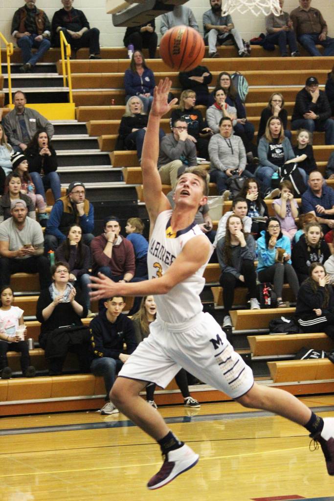 Homers Clayton Beachy attempts a layup during a Friday, Jan. 25, 2019 game against Nikiski Middle-High School at the Alice Witte Gymnasium in Homer, Alaska. (Photo by Megan Pacer/Homer News)