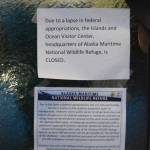 A sign on the door last Friday, Dec. 28, of the Alaska Islands and Ocean Visitor Center in Homer, Alaska, indicates that the headquarters of the Alaska Maritime National Wildlife Refuge is closed. Public access to refuge lands remains open, including a trail from the visitor center to Beluga Slough. (Photo by Michael Armstrong/Homer News)