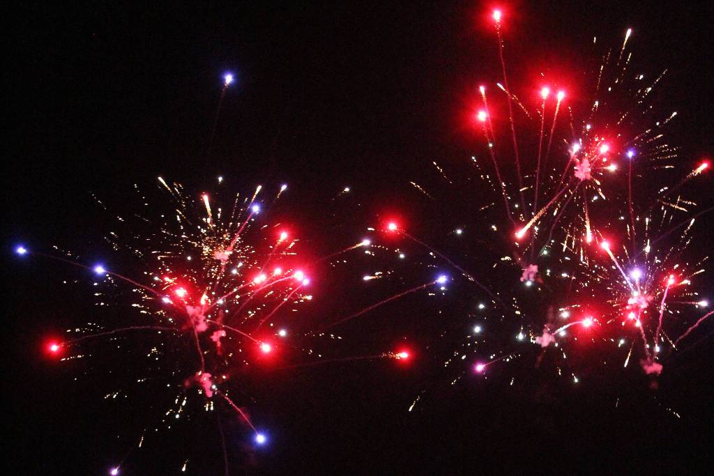 Fireworks explode in the sky above Mariner Park on New Years Eve, Dec. 31, 2018 in Homer, Alaska. (Photo by Megan Pacer/Homer News)