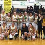 The Homer girls basketball team holds their first place trophy at the Service Cougar Tip Off tournament, held Friday and Saturday, Dec. 14-15, 2018 in Anchorage, Alaska. Top row from left to right: Marina Carroll, Cora Parish, Bri Hetrick, Rylyn Todd, Alia bales, Kelli Bishop, Lexi Dawson, Laura Inama, Manager Brooke Knotte, and Manager Katie Clark. Bottom row: Shelly Johnson, Alexis Kreger, Hannah Hatfield, and Rylee Doughty. (Photo by Wendy Todd)