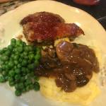 For a hearty meal on cold winter days, try Moms Meatloaf with green peas and mashed potatoes with mushroom gravy. (Photo by Teri Robl)