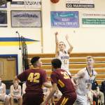 Homers Daniel Reutov takes a shot during a Thursday, Jan. 10, 2019 game against Mt. Edgecumbe in Homer, Alaska. (Photo by Megan Pacer/Homer News)