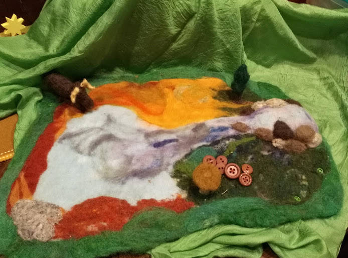 Hanna Youngs story apron with some of her felted figures. (Photo provided)