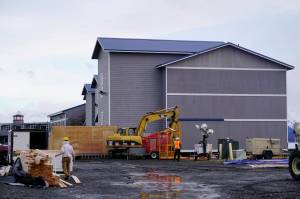 Carpenters with Steiners North Star Construction on Monday, Jan. 14, 2019 work on an addition at Lands End Resort on the Homer Spit in Homer, Alaska. (Photo by Michael Armstrong/Homer News)