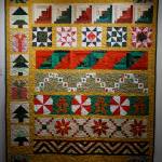 Donna Hinkles Christmas Quilt, one of the works in the 9 Women / 9 Quilts show that opened last Friday, Feb. 1, 2019, at the Homer Council on the Arts, in Homer, Alaska. (Photo by Michael Armstrong/Homer News)