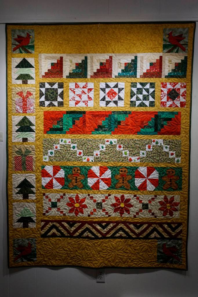 Donna Hinkles Christmas Quilt, one of the works in the 9 Women / 9 Quilts show that opened last Friday, Feb. 1, 2019, at the Homer Council on the Arts, in Homer, Alaska. (Photo by Michael Armstrong/Homer News)