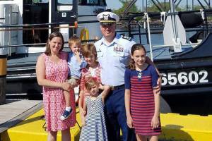 Chief Warrant Officer Michael Kozloski, center, his wife, Brienne, and their four children in an undated photo. (Photo by Brienne Kozloski and used with permission)