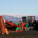 Homer Volunteer Fire Department emergency medical technicians treat Chief Warrant Officer Michael Kozloski, a crew member of the U.S. Coast Guard Cutter Hickory, after he was injured when a crane tipped over at the Pioneer Dock on the Homer Spit on Thursday, Jan. 31, 2019, in Homer, Alaska. Kozloski was later pronounced dead at South Peninsula Hospital. (Photo by Michael Armstrong/Homer News.)