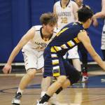 Galenas Kevin Bergman looks for a way around Homers Seth Adkins on Thursday, Feb. 7, 2019 during the Winter Carnival Basketball Tournament in Homer, Alaska. (Photo by Megan Pacer/Homer News)