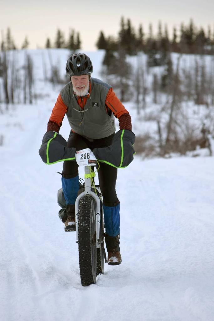 Doug Armstrong finishes off a section of Fat Freddies Bike Race and Ramble on Saturday, Feb. 9, 2019, in the Caribou Hills near Freddies Roadhouse. (Photo by Jeff Helminiak/Peninsula Clarion)