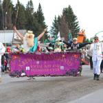 Members of the Krewe of Gambrinus march down Pioneer Avenue on Saturday, Feb. 9, 2019 during the Winter Carnival Parade in Homer, Alaska. (Photo by Megan Pacer/Homer News)