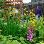 Francie Roberts Everything Garden includes flower beds, fountains, a vegetable garden and a greenhouse. It was one of five gardens featured in the 2018 Homer Garden Tour. (Photo by Michael Armstrong/Homer News)