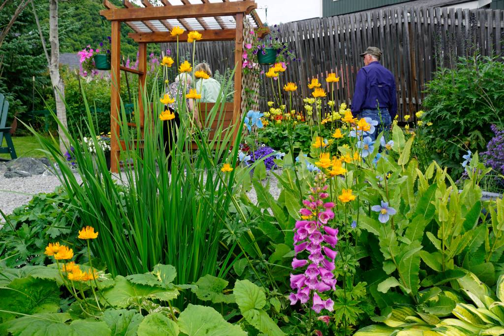 Francie Roberts Everything Garden includes flower beds, fountains, a vegetable garden and a greenhouse. It was one of five gardens featured in the 2018 Homer Garden Tour. (Photo by Michael Armstrong/Homer News)