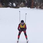 Kenais Summer Foster steers down a steep hill Saturday afternoon at the Kenai Peninsula Borough nordic ski meet at the Tsalteshi Trails in Soldotna. (Photo by Joey Klecka/Peninsula Clarion)