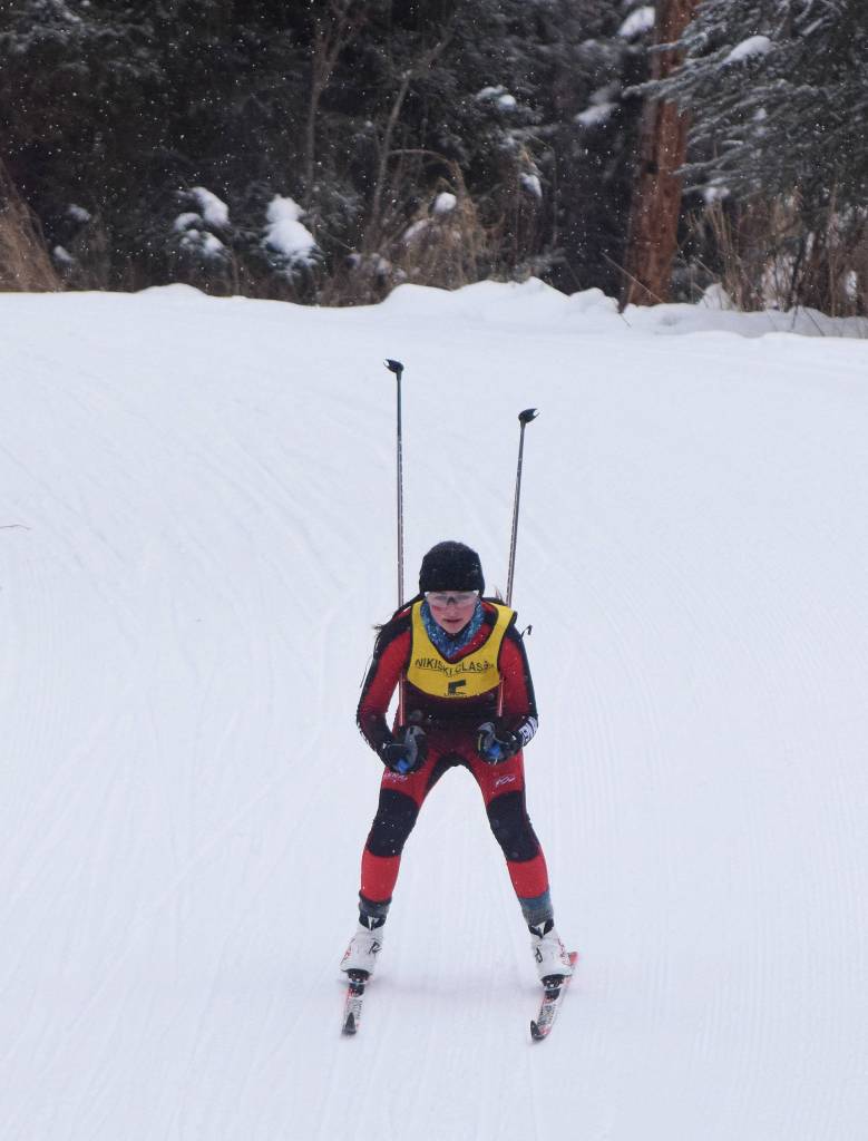 Kenais Summer Foster steers down a steep hill Saturday afternoon at the Kenai Peninsula Borough nordic ski meet at the Tsalteshi Trails in Soldotna. (Photo by Joey Klecka/Peninsula Clarion)
