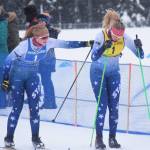 Soldotnas Sonora Martin (left) tags off to teammate Cameron Blackwell in a relay race Saturday afternoon at the Kenai Peninsula Borough nordic ski meet at the Tsalteshi Trails in Soldotna. (Photo by Joey Klecka/Peninsula Clarion)