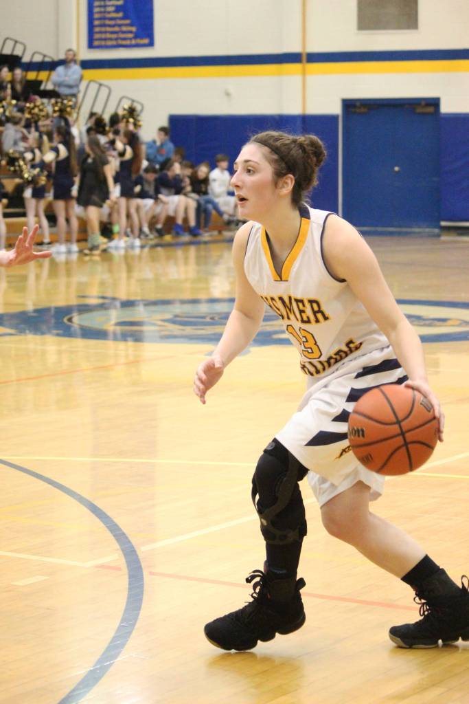 Homers Rylyn Todd dribbles the ball during a Friday, Feb. 22, 2019 game against Grace Christian School in Homer, Alaska. Todd was celebrated along with two other Lady Mariners for Senior Night. (Photo by Megan Pacer/Homer News)