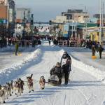 Defending champion Joar Lefseth Ulsom runs his team down Fourth Ave during the ceremonial start of the Iditarod Trail Sled Dog Race Saturday, March 2, 2019 in Anchorage, Alaska. (AP Photo/Michael Dinneen)