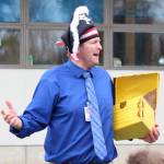 Paul Banks Elementary School Principal Eric Pedersen tells his students about how many minutes they managed to read during a celebration to the end of their read-a-thon Thursday, March 7, 2019 at the school in Homer, Alaska. (Photo by Megan Pacer/Homer News)