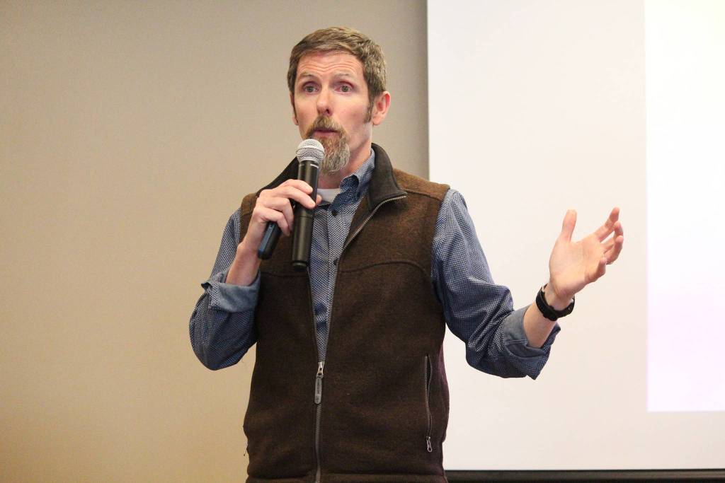 Mike Heatwole, vice president of public affairs for the Pebble Limited Partnership, speaks to a crowd of people Tuesday, March 19, 2019 during a community meeting at Lands End Resort in Homer. (Photo by Megan Pacer/Homer News)