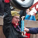 Shayna Perry, of Eagle River, holds up her winning 26.7-pound white salmon at the award ceremony following the Homer Winter King Salmon Tournament on Saturday, March 23, 2019 at Coal Point Seafoods in Homer, Alaska. Perry, who also won the award for largest white salmon, is the first woman to win the annual tournament. (Photo by Megan Pacer/Homer News)