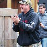 Chad Webb accepts his second place award for his 25.44-pound king salmon Saturday, March 23, 2019 at the Homer Winter King Salmon Tournament in Homer, Alaska. (Photo by Megan Pacer/Homer News)