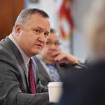 Sen. Mike Shower, R-Wasilla, questions Dr. Suzanne Allen, from Boise, Idaho, who was giving an overview of the WWAMI School of Medical Education program to the Senate Finance Committee at the Capitol on Monday, March 25, 2019. (Michael Penn | Juneau Empire)