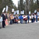 Protestors stand outside the Cannery Lodge in Kenai, AK ahead of Governor Dunleavys presentation about his proposed budget on March 26, 2019. (Photo by Victoria Petersen/Peninsula Clarion)
