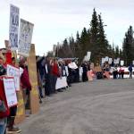 Protesters stand outside the Cannery Lodge in Kenai, Alaska, ahead of Gov. Mike Dunleavys presentation about his proposed budget on March 26, 2019. (Photo by Victoria Petersen/Peninsula Clarion)