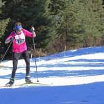Tamra Kornfield skis to the finish line of the Sea to Ski Triathlon to win first place in the Ironwoman category Sunday, March 31, 2019 in Homer, Alaska. (Photo by Megan Pacer/Homer News)