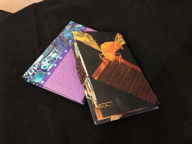 Art by Jenny Stroyeck, left, and Mary Huff, right, from By the Book at Ptarmigan Arts. (Photo provided)