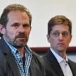 Dr. Daniel Schindler, a professor in the School of Aquatic and Fishery Sciences at the University of Washington, left, and Dr. Cameron Wobus, a Senior Scientist at Lynker Technologies, present at a press conference against thePebble Mine project on Monday, April 1, 2019. (Michael Penn | Juneau Empire)