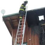 Anchor Point Fire & EMS and Ninilchik Emergency Services firefighters respond to a chimney fire at a Long Gone Avenue home after 7:15 p.m. April 5, 2019, near Anchor Point, Alaska. (Photo provided)