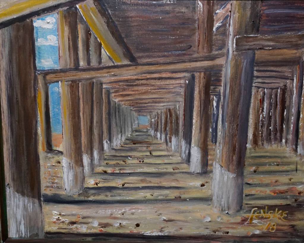 Pile Geometrics, one of John Fenskes paintings at the First Friday, April 5, 2019, opening for his retrospective showing at Kachemak Bay Campus in Homer, Alaska. (Photo by Michael Armstrong/Homer News)